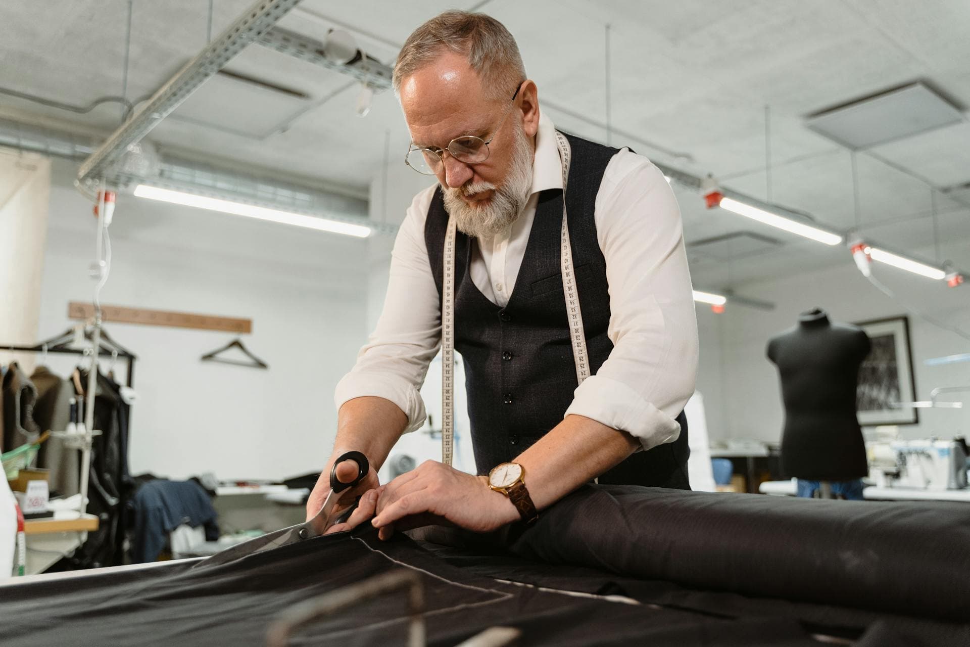 Tailor completing clothing alterations in London